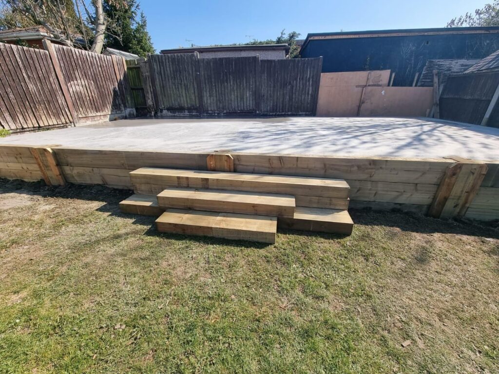 Concrete base with wooden steps